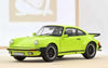 Modellauto 1976er Porsche 911 3.0 in Hellgrün metallic im Maßstab 1:18 | Automodelle von Norev in 1 zu 18  